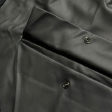 Rubberized oversized poncho