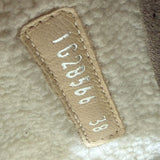 Quilted leather shearling trim boot