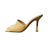 Stretch mule sandal heel