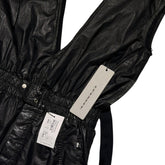 Waxed “body bag” jumpsuit
