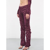 Wet look knit stretch trousers