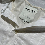 Double layered tank button down