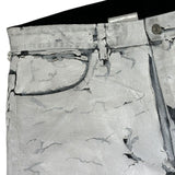 Crackled painted thigh zip denim