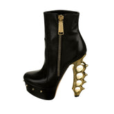 Runway brass knuckle bootie heel