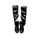 Thigh high patent boot