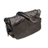 Quilted leather cargo barrel bag