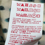 Speckled graphic strap top