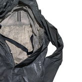 Sarcafago waxed parka