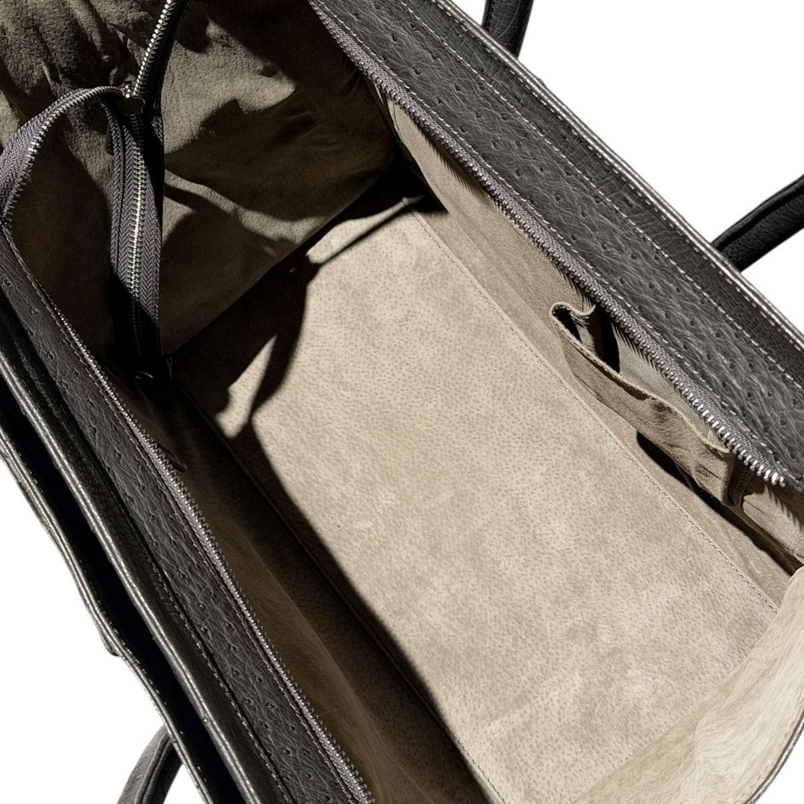 Ostrich leather expandable bag