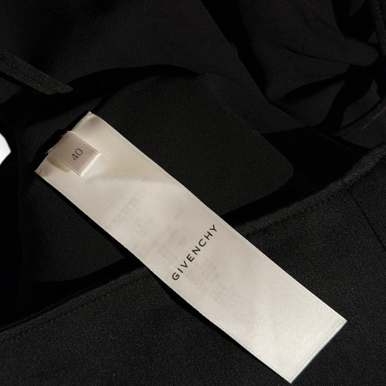 $2,590 asymmetric drape dress with G link chain