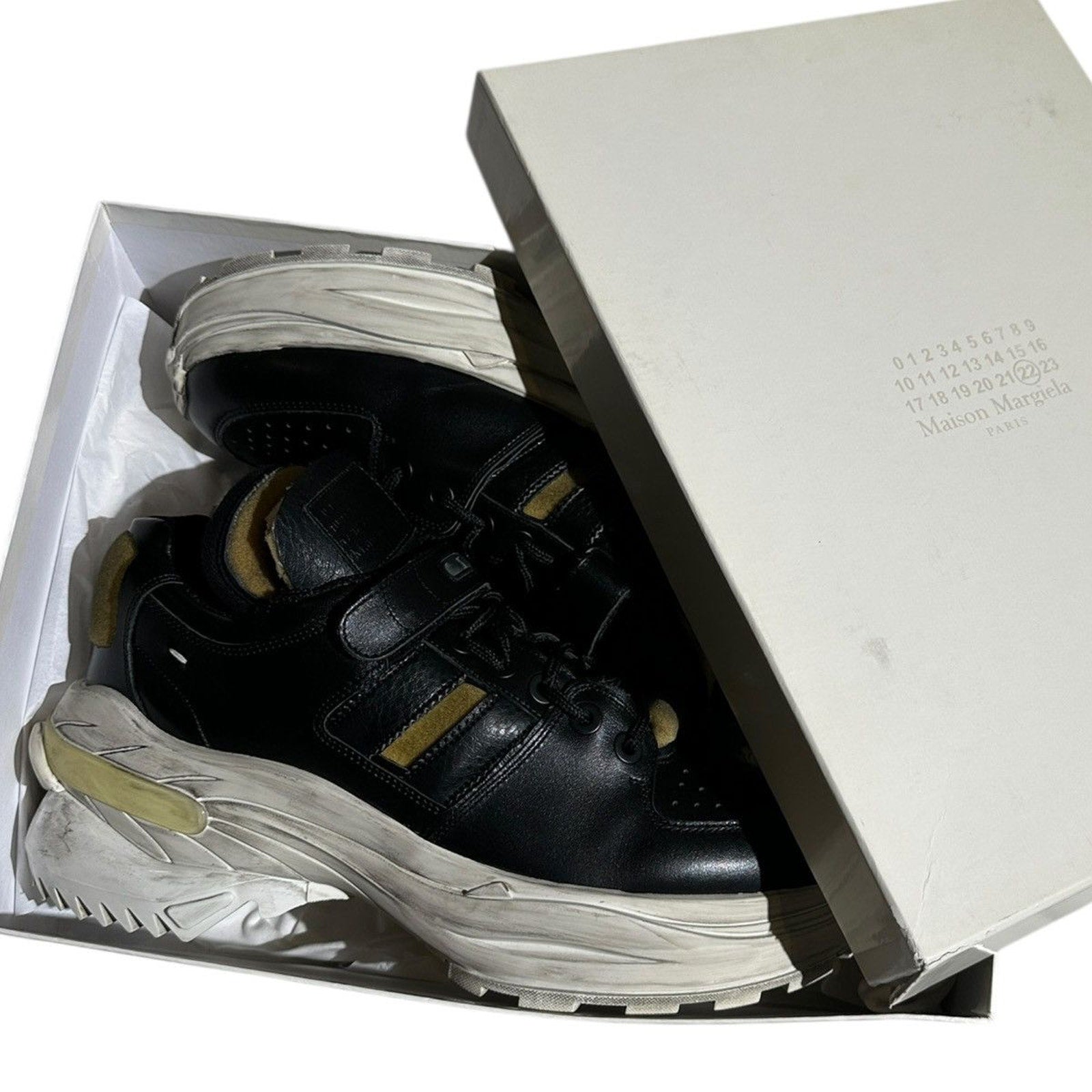 Retro fit deconstructed sneaker
