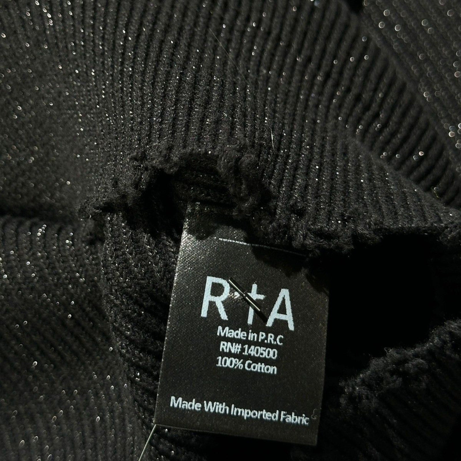 Pierced glitter ribbed sweater