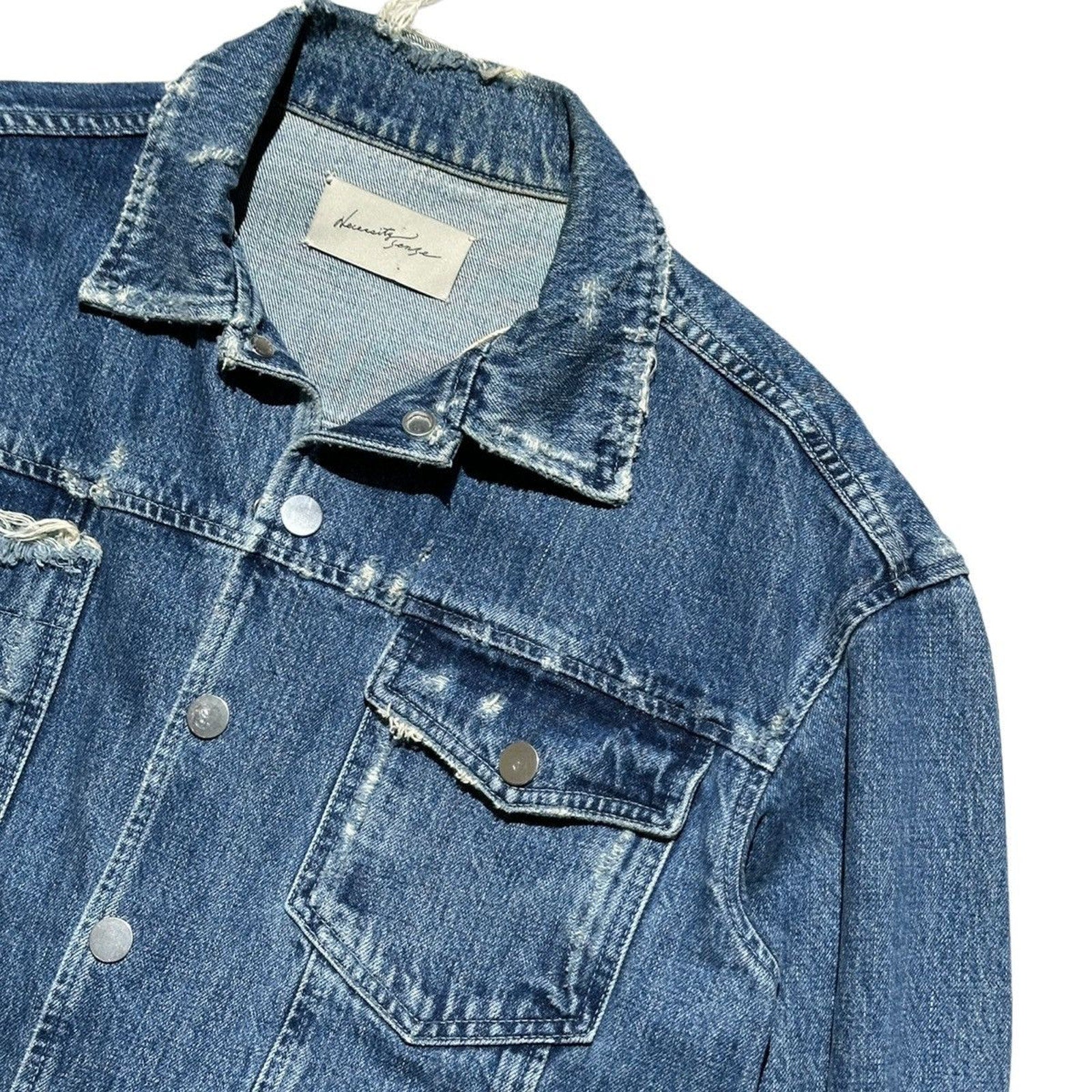 Distressed snap button denim trucker jacket