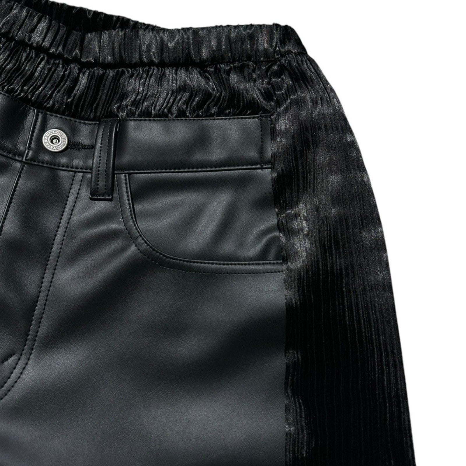 $1,400 Pleated deconstructed adjustable pants