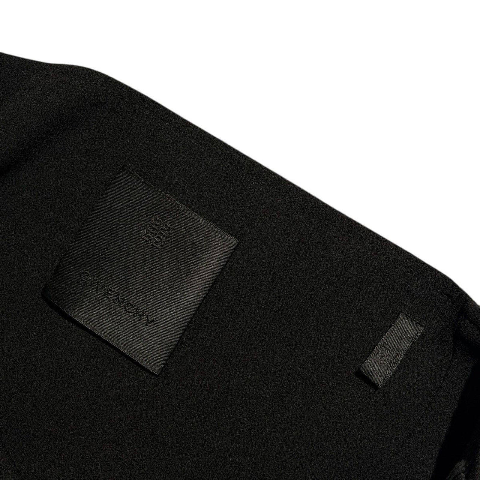 $2,590 asymmetric drape dress with G link chain