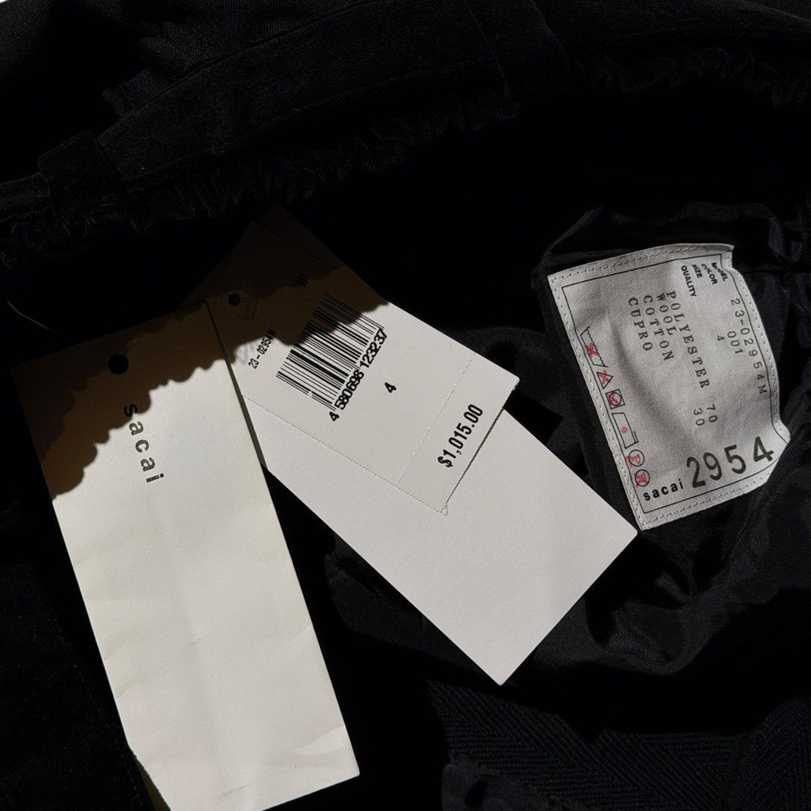 Tailored pleated belted shorts