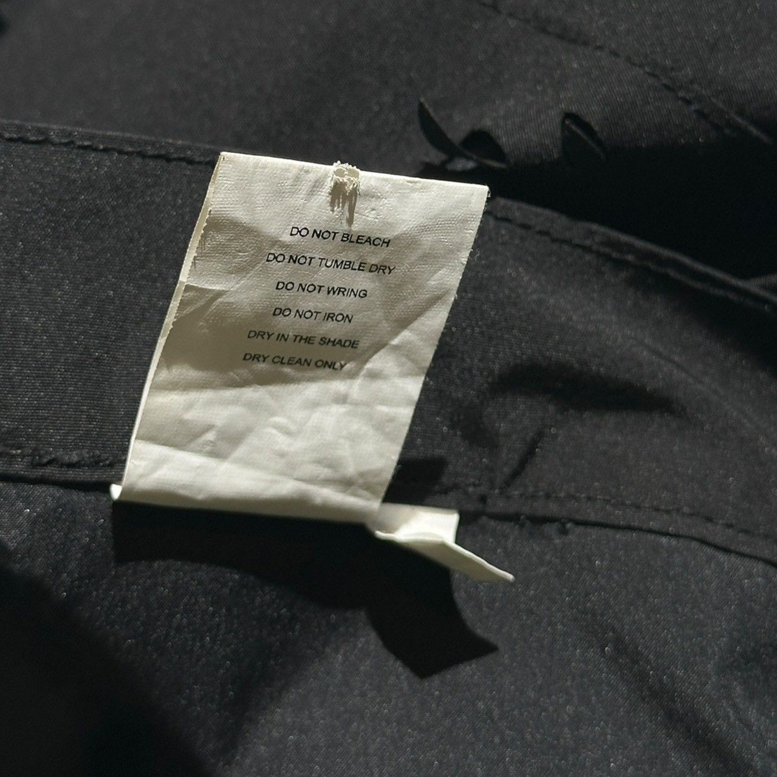 Laser slashed zip cargo pant