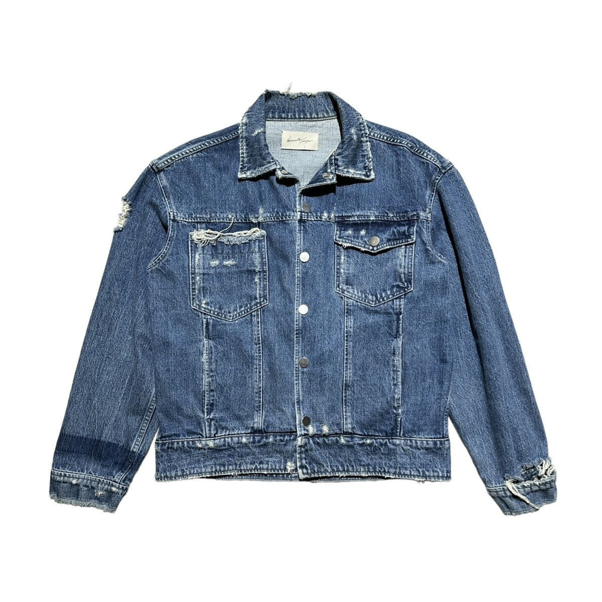 Distressed snap button denim trucker jacket