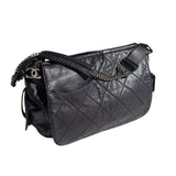 Quilted leather cargo barrel bag