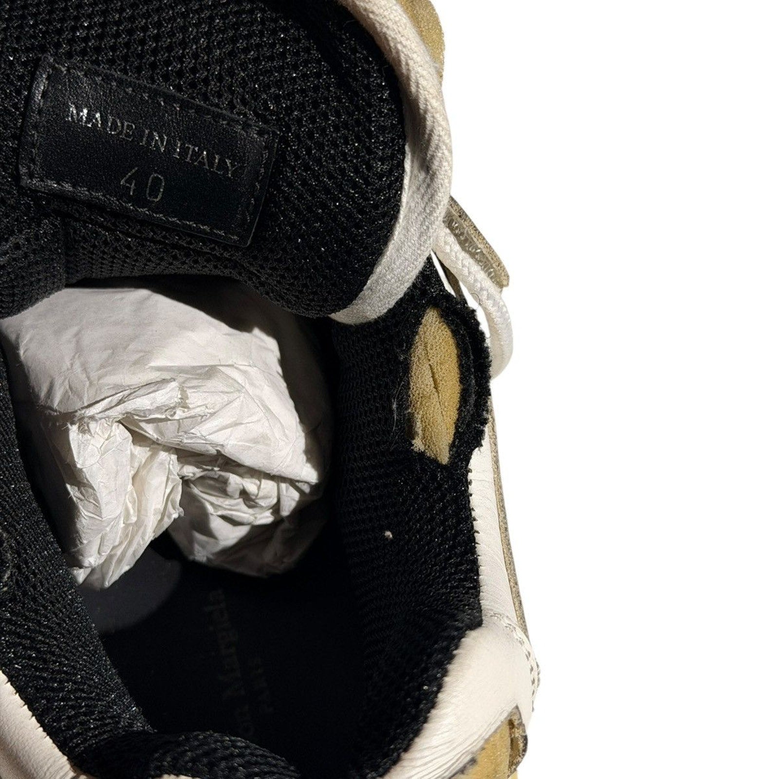“Worn” look strap sneaker