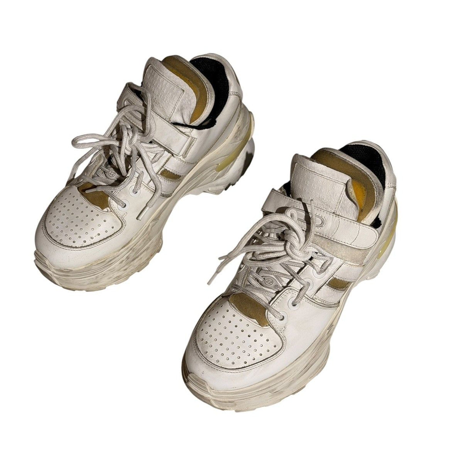 “Worn” look strap sneaker