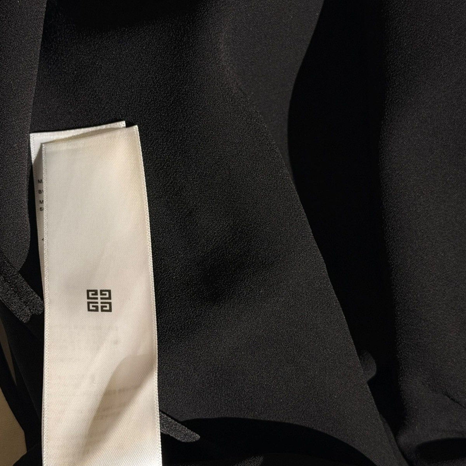 $2,590 asymmetric drape dress with G link chain