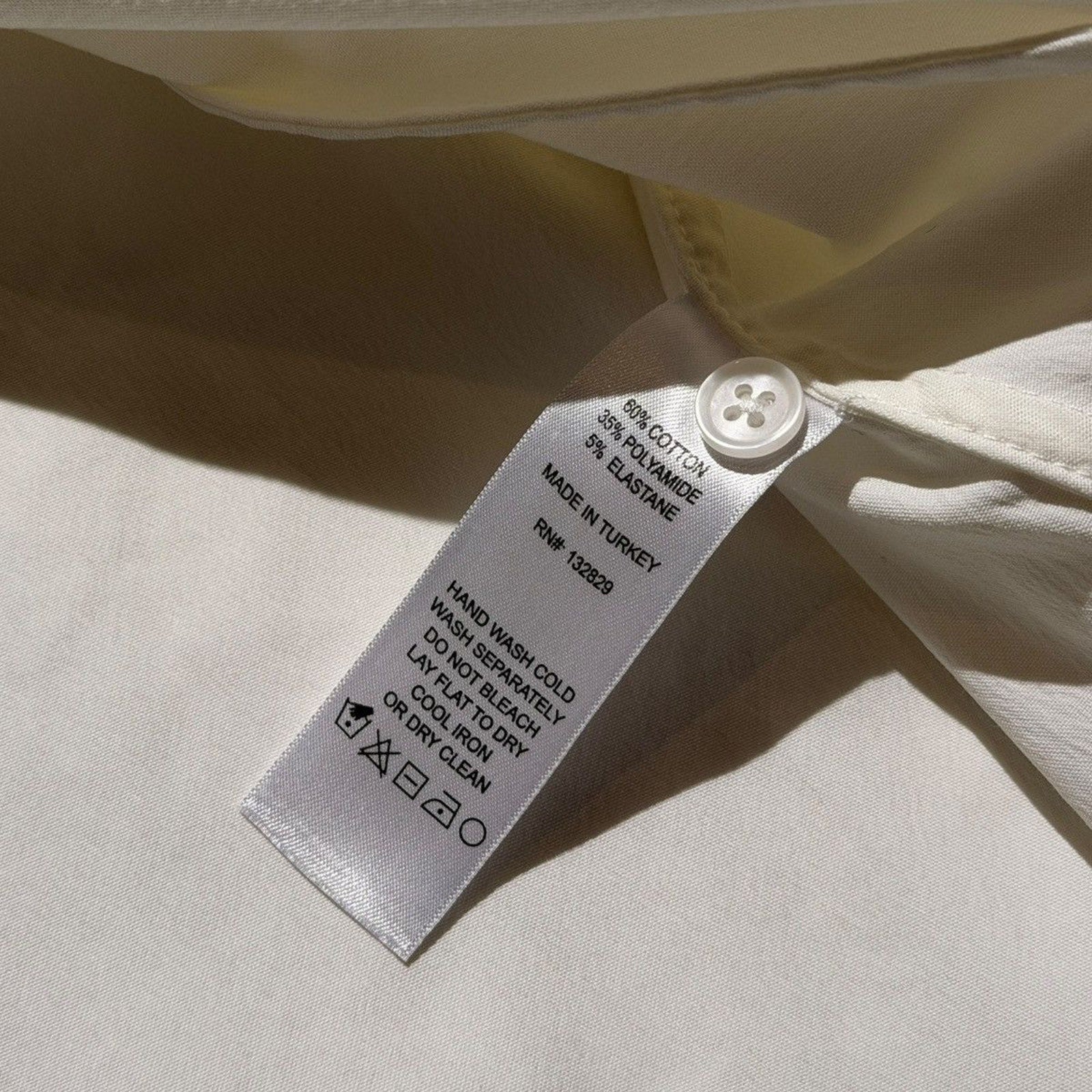 Haelo cinch back button down