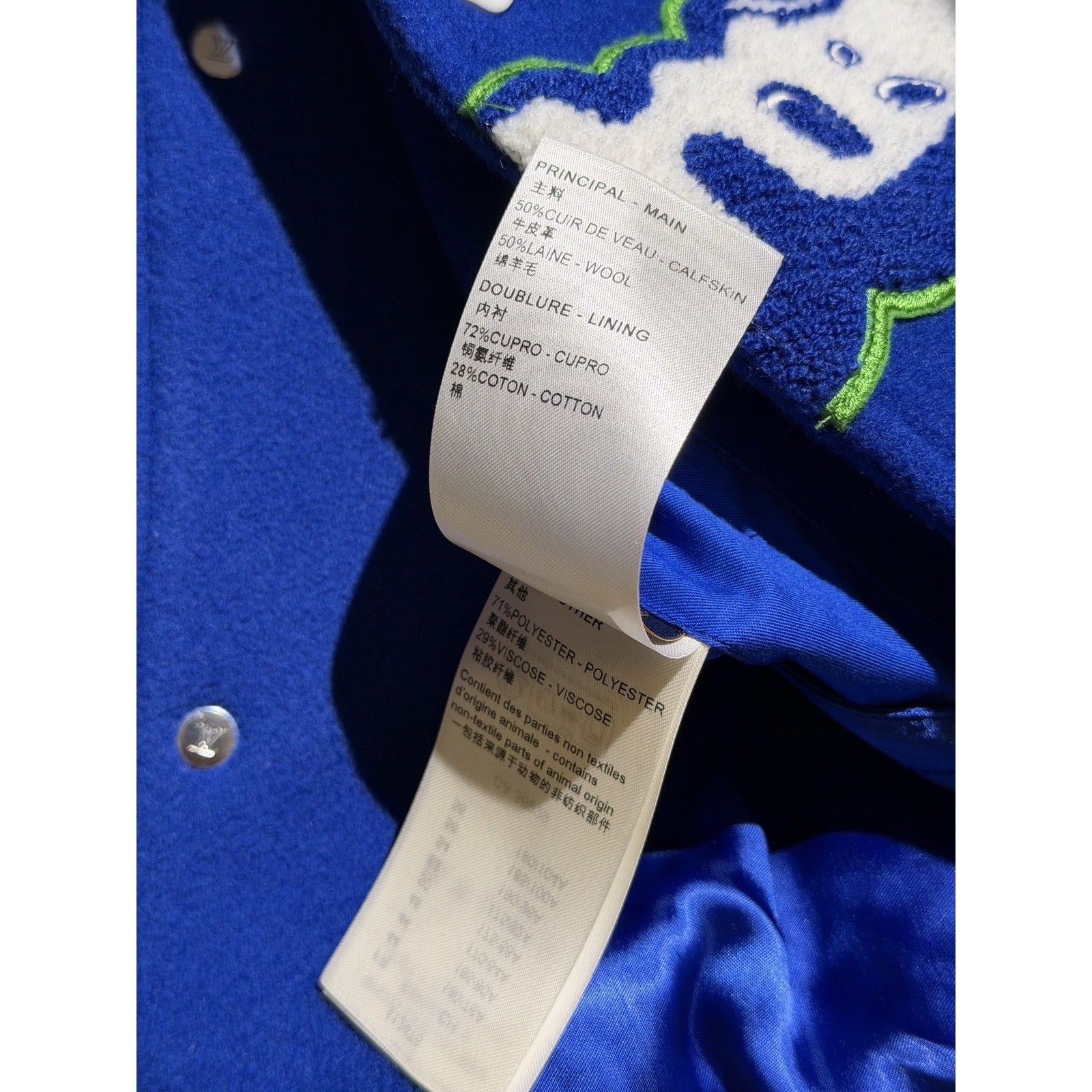Embroidered world varsity blouson bomber