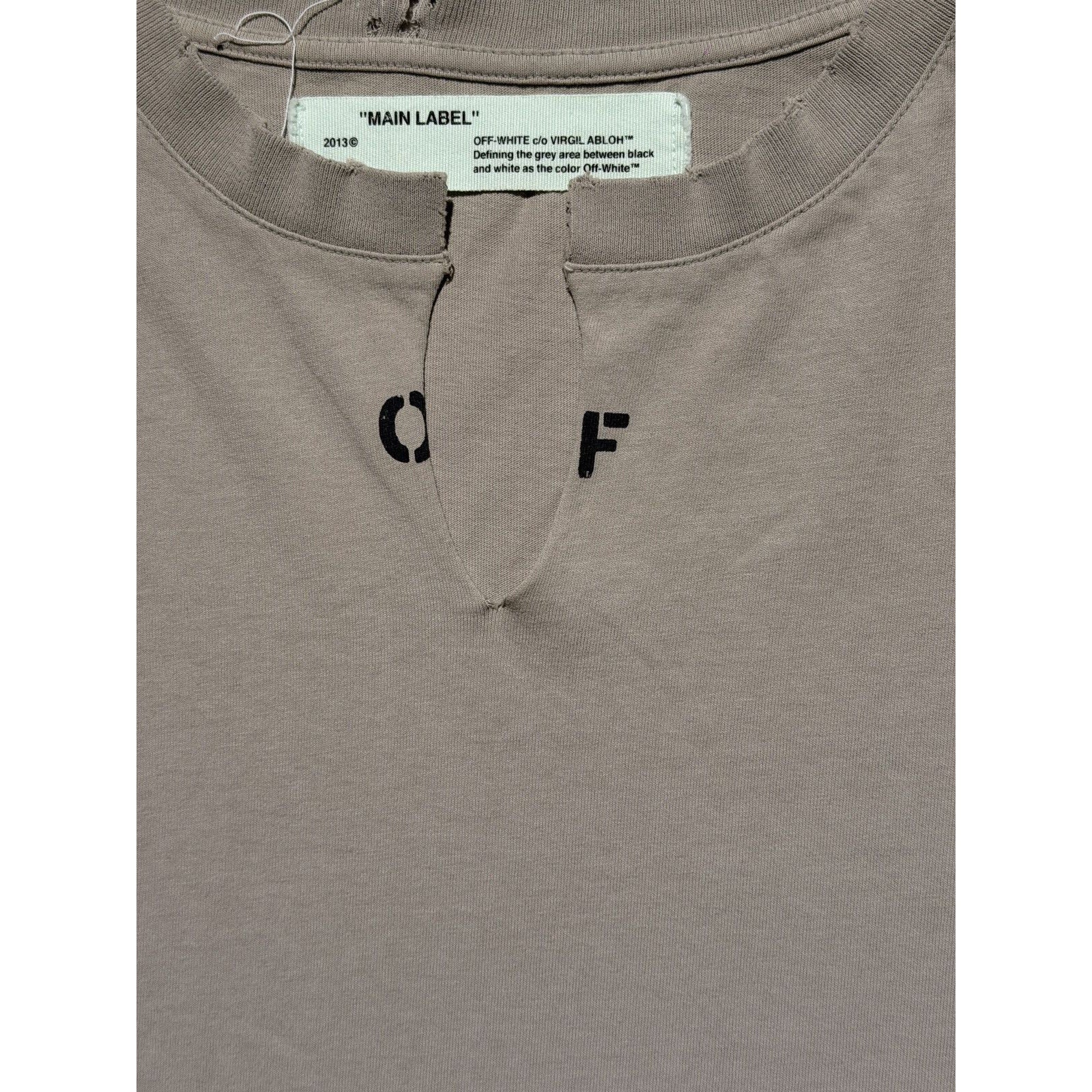 V neck slit “off” tee