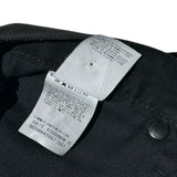 Waxed coated denim pants