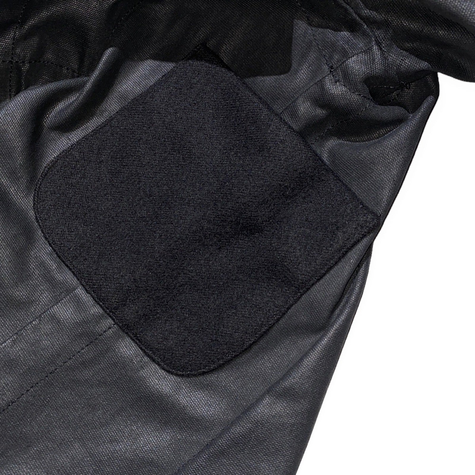 2003 “Suckerball” waxed denim cargo runway jacket